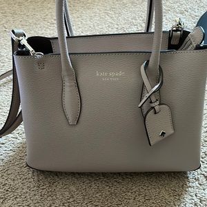 Light pink Kate Spade crossbody purse